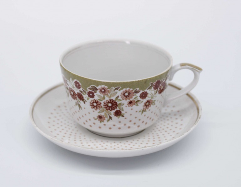 Riga porcelain cup and saucer. Porcelain, decal. Diameters 9 cm and 14.3 cm.