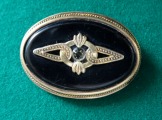 Silver brooch with crystal, gold plated