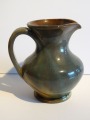Ceramic vase with handle. Daiļrāde