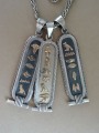 Egyptian silver amulets on a chain. Silver gold