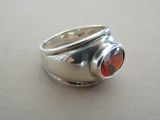 Silver ring with garnet, purity 925, 6.76 g.