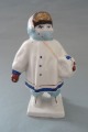 Porcelain figure Girl in a fur coat, h 15.5 cm