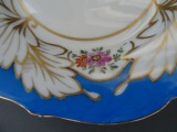 Porcelāna šķīvis ar zilu mālu T.K. d 21 cm