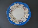 Фарфоровая тарелка с голубой каймой Т.К. d 21 см