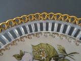 RPR - Porcelāna šķīvis ar ziediem, roku apgleznojums Broka Brūce d 23,5 cm