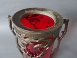 Red vase in a metal frame h 22 cm