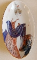 Decorative bowl. A lady with a scarf