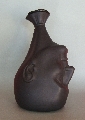 Vase. A man's head (black)